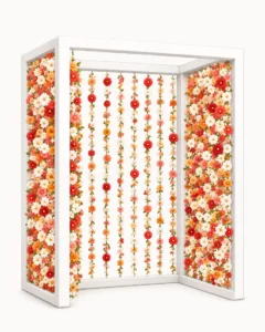 Photobooth fleuri avec rideau de fleurs suspendues pour événement